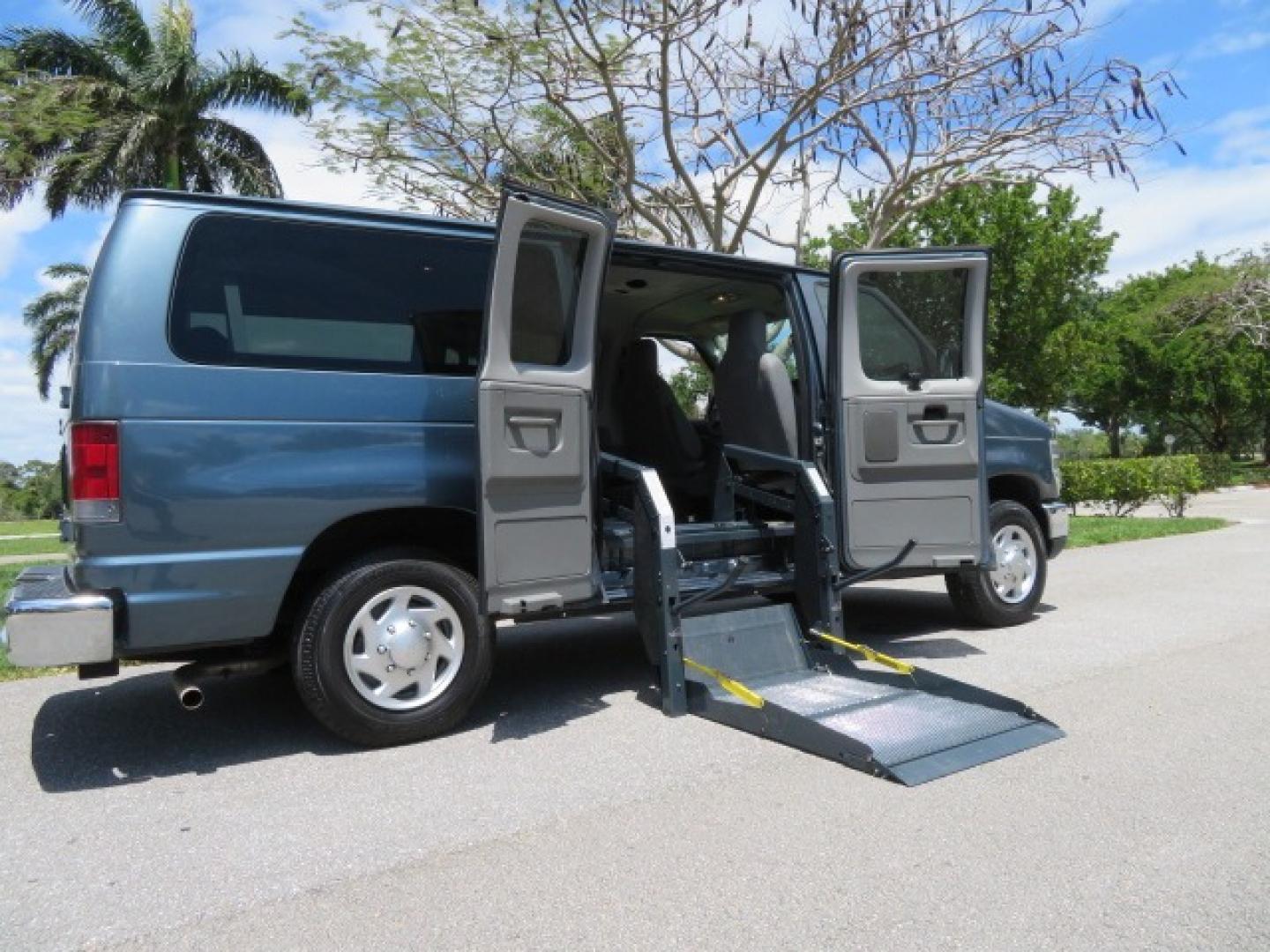 2013 Dark Blue /Gray Ford E-Series Wagon XLT (1FMNE1BW4DD) with an 4.6L V8 engine, Automatic transmission, located at 4301 Oak Circle #19, Boca Raton, FL, 33431, (954) 561-2499, 26.388861, -80.084038 - You are looking at a Gorgeous 2013 Ford E150 XLT Handicap Wheelchair Conversion Van with 22K Original Miles, Tie Down System, Power Electric VMI Side Entry Wheelchair Lift, Back Up Camera, Factory Navigation and Much Much More. This van is Awesome. This is a Nice Rust Free Van with a Clean Carfax, C - Photo#44